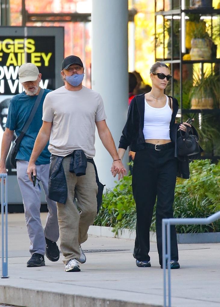 Leonardo DiCaprio and his girlfriend, Vittoria Ceretti, held hands while walking in New York City on Wednesday.