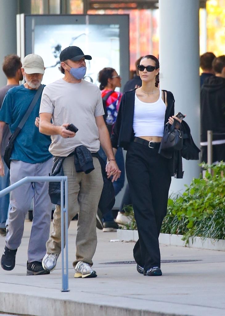 Leonardo DiCaprio and his girlfriend, Vittoria Ceretti, held hands while walking in New York City on Wednesday.